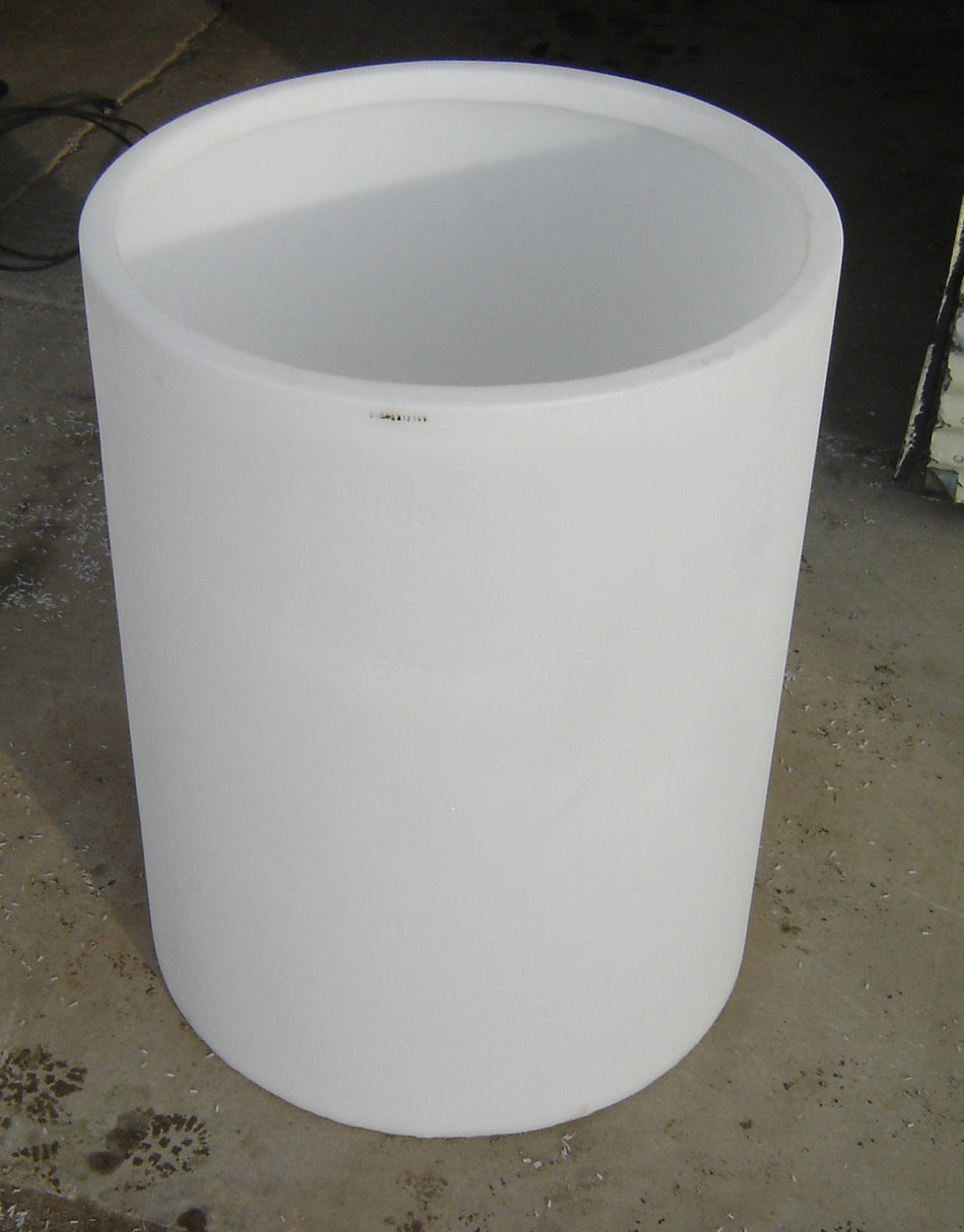 White cylindrical container on a concrete floor